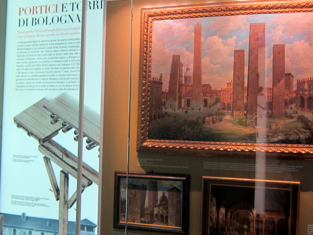 Description of earliest porticos and painting of early city with lots of towers