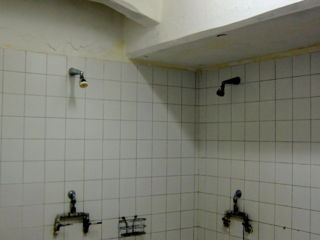 And finally the shower with peeling paint, plumbing in disrepair and a floor as slippery as ice. The only place in the world that I wear flip-flops.