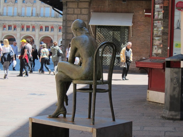 Sitting on the bench eating and excellent gelato there were two of several statues nearby - this is one